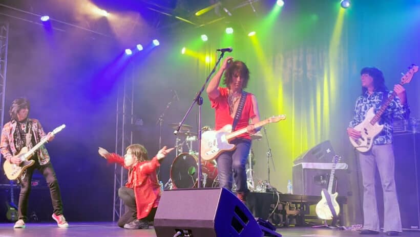 rolling stones tribute band performing on stage
